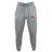 The SF CDME Rugby Leisure Sweatpant by EMB Canterbury is crafted from soft organic cotton in gray, offering a comfortable drawstring waist. The left thigh features a white EMB Canterbury logo, while the right thigh showcases a red cross emblem with text—making it an ideal choice for relaxed style. Displayed against a plain white background.