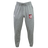 The Montgomery Bucks Griffins Leisure Sweatpant by EMB Canterbury is made from organic cotton, featuring an elastic waistband, drawstring, white thigh logo, and a red patch with a lion's head and "METU" text on the other.