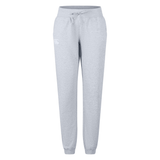 The Women's Leisure Sweatpant by Canterbury features light grey leisure sweatpants for women, designed with an elastic waistband, drawstring, and side pockets. The ribbed cuffs ensure a snug fit at the ankles. Crafted from a soft cotton blend fleece, these sweatpants deliver maximum comfort and style.