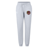 Introducing the Godzilla Rugby Football Club Women’s Leisure Sweatpant by EMB Canterbury: a light gray sweatpant made from soft organic cotton fleece, featuring a comfortable drawstring waist and a vibrant embroidered patch of the Godzilla RFC rooster and shield on the left thigh.