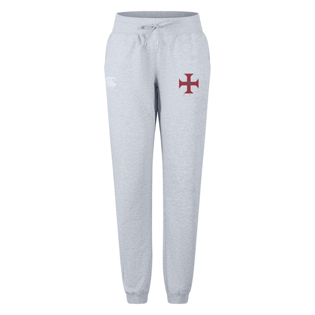 The SF CDME Rugby Women's Leisure Sweatpant by Canterbury from EMB Canterbury features a light gray design with an elastic waistband, drawstring, and a red cross emblem on the left thigh, offering women stylish comfort for everyday wear.