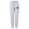 Introducing the Minneapolis Mayhem Rugby Women’s Leisure Sweatpant by Canterbury from EMB Canterbury: these light gray organic cotton sweatpants feature a comfortable drawstring waist, a striking blue and black “Mavericks” logo on the left thigh, and a subtle white Canterbury logo on the right side. Designed specifically for women, these leisure sweatpants offer both comfort and style for everyday wear.