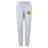 Light gray Berkeley RFC Women’s Leisure Sweatpant by Canterbury jogger-style sweatpants with a drawstring waist and a rectangular patch featuring a yellow bear logo on the left hip.
