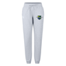 The Kingwood Rugby Women's Leisure Sweatpant by EMB Canterbury features a light grey color, drawstring waist, side pockets, and a colorful embroidered crest—ideal for casual comfort.