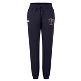 The Spartan Youth Rugby Women's Leisure Sweatpant by EMB Canterbury features navy blue fabric, an elastic waistband with drawstring, a white Canterbury logo on the right thigh, and a yellow and blue emblem on the left thigh—ideal for leisure.