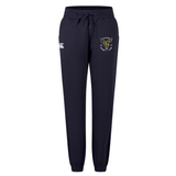 The Hornets Rugby Club 1977 Women's Leisure Sweatpant by EMB Canterbury is crafted from soft organic cotton sweatpants material, featuring a navy blue color with a drawstring waist, elastic cuffs, a white Canterbury logo on the left thigh, and an embroidered crest with a fox and text on the right thigh, displayed on a white background.