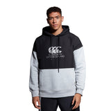 A man wearing a Canterbury Canterbury Legends Panel Hoody.