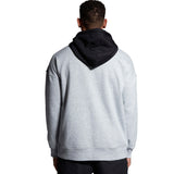 The back view of a man wearing a Canterbury Legends Panel Hoody by Canterbury, in grey and black. Coming soon.