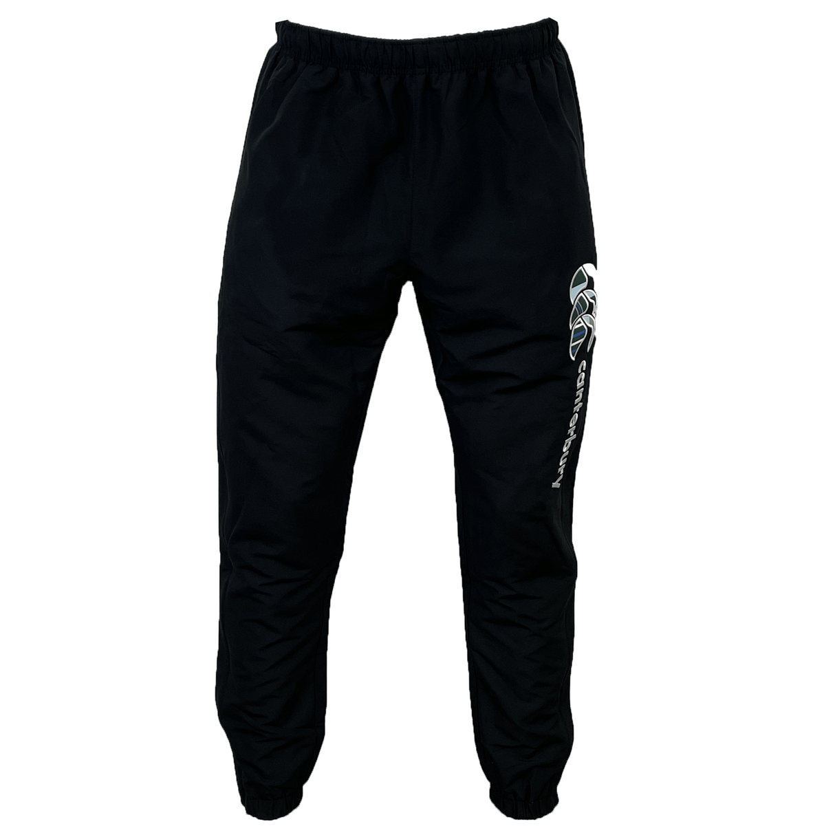 These Canterbury Uglies Stadium Pants from Canterbury feature black track pants with an elastic waistband and cuffs, adorned with a white and blue graphic design on the left thigh. Combining style and comfort, these pants have a tapered leg design.