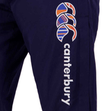 Close-up of the Canterbury Uglies Stadium Pants in navy blue, showcasing a colorful abstract design. The word "Canterbury" is printed on the side and the pants feature a stylish tapered leg.