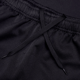 Close-up of the Canterbury Professional Short 2.0, featuring a black elastic waistband and X-tied drawstring for an adjustable, durable fit.