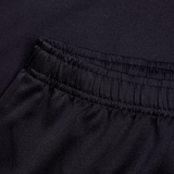 Close-up of the waistband and upper section of Canterbury's Professional Short 2.0, showing gathered elastic for adjustable fit and smooth black fabric.
