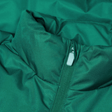 Close-up of a teal-colored Ireland 24 Puffer Jacket by Canterbury, featuring textured fabric and a visible front zipper. Just In at Canterbury.