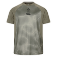 The Ireland 25/26 Superlight Training T-Shirt by Canterbury features an olive green and grey abstract design, IRFU emblem, and Canterbury logo. This breathable tee is ideal for workouts or casual wear.