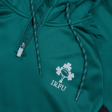 Ireland Training Hoodie 24 by Canterbury, a green sports jacket with a half-zipper, is crafted from 100% Polyester and features the IRFU logo with a rugby ball and three shamrocks. Perfect for an Ireland training session.