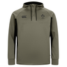 The Ireland 25/26 Training Hoodie by Canterbury features khaki green fabric, a front pocket, black side panels, a hood, and chest logos—ideal for IRFU fans seeking the perfect Canterbury training hoodie.
