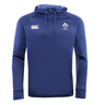 The Ireland 25/26 Training Hoodie by Canterbury is a blue long-sleeve rugby hoodie with a drawstring hood, featuring the Canterbury logo on the right chest and the IRFU logo on the left.