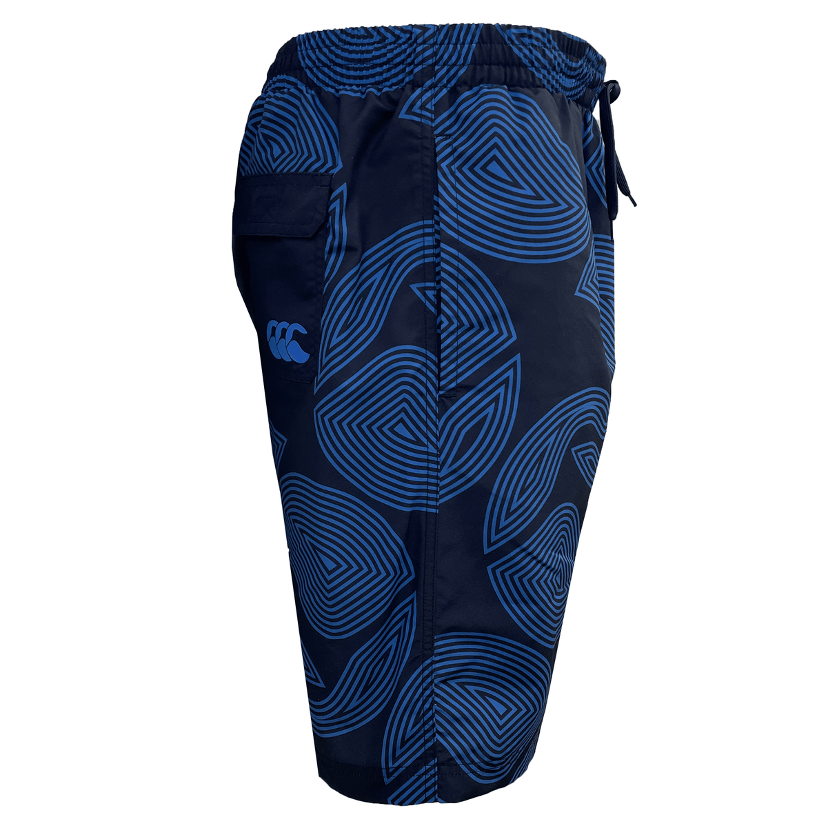The Canterbury Radial Awning 8in Woven Swim Short comes in navy blue with a pattern design, showcasing a logo on the side. It features an elasticated waistband and includes a convenient Velcro back pocket.