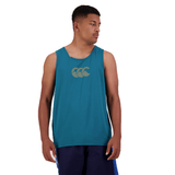 A person wearing the Canterbury Radial CCC Logo Singlet in teal gazes to the side against a pristine white background.