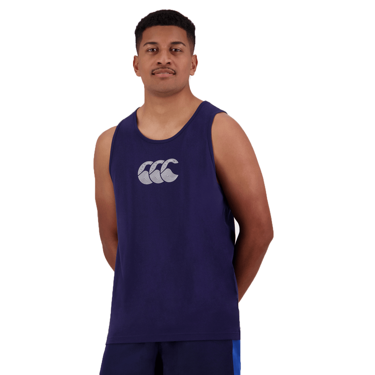 A man wearing the Canterbury Radial CCC Logo Singlet in navy, standing against a white background.