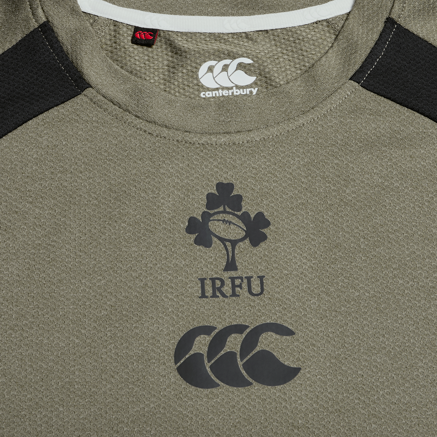 Close-up of the Ireland 25/26 Autumn Internationals Elite Training Tee by Canterbury, showcasing the IRFU logo and advanced Vapodri technology for comfort on the chest.