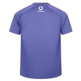 The Ireland 25/26 Six Nations Elite Training Tee by Canterbury is a purple short-sleeve shirt seen from the back, with a white Vodafone logo near the neckline—a classic rugby training top from Canterbury.