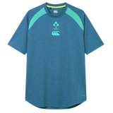 The Ireland 26/27 Summer Tour Elite Training Tee by Canterbury features blue short sleeves with light green shoulder panels, IRFU and Canterbury chest logos, delivering top comfort and performance for rugby fans.
