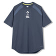 The Ireland 26 Elite Training Tee by Canterbury is a short-sleeve navy blue athletic shirt featuring IRFU and Canterbury logos on the chest, designed specifically as an Ireland rugby training tee and crafted from Vapodri breathable sportswear fabric, shown against a plain white background.