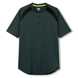 The Ireland 26 Elite Training Tee by Canterbury features a dark green design with short sleeves, black shoulder panels, and a subtle chest logo. Inspired by the classic Ireland rugby training tee, this Canterbury shirt offers a comfortable crew neckline and a slightly rounded hem. Crafted with Vapodri breathable technology, it’s designed to keep you cool during intense workouts.