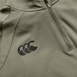 Close-up of the Ireland 25/26 Elite First Layer 1/4 Zip by Canterbury, showcasing its khaki texture, 1/4 zip pocket, and black Canterbury logo.