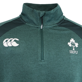 Show your support in the Ireland 25/26 Elite First Layer 1/4 Zip by Canterbury, featuring the iconic Canterbury logo on the left and the IRFU shamrock crest on the right.