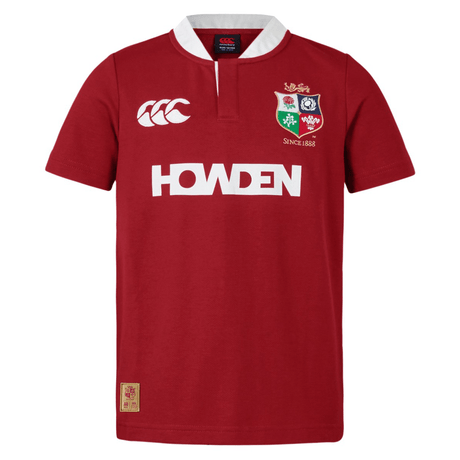 The Youth British & Irish Lions 2025 Classic Jersey by Canterbury is a red rugby jersey with a white collar and short sleeves. It features the CCC logo on the right, four crests on the left, and "HOWDEN" in bold white, celebrating the storied legacy of the team.