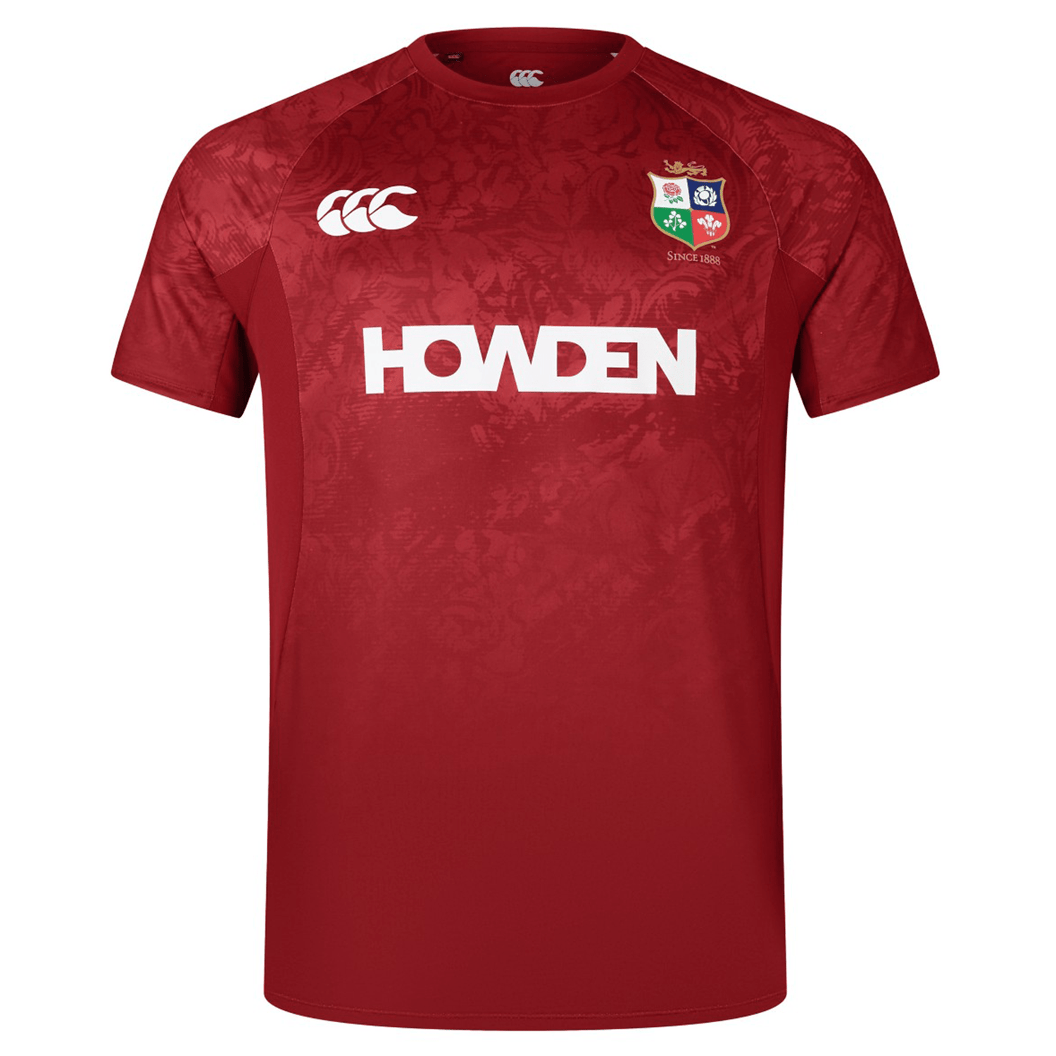 The British & Irish Lions 25 Superlight Training Tee by Canterbury is a red rugby jersey adorned with the "HOWDEN" logo, featuring the iconic white lion and shamrock crests alongside Canterbury's renowned emblem. This tee perfectly combines traditional elements with advanced sportswear technology, making it ideal for fans of the British & Irish Lions.