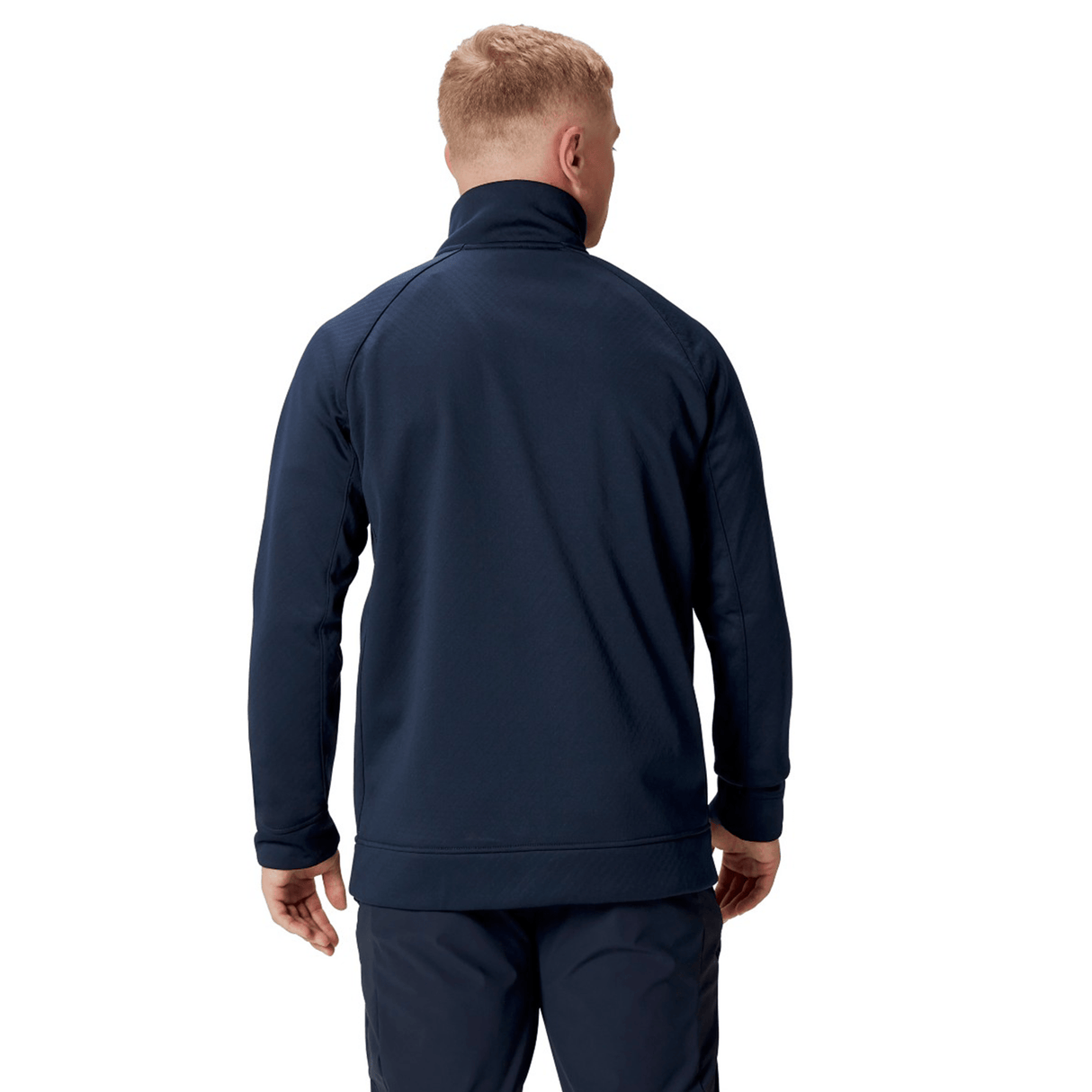 A person clad in the British & Irish Lions 2025 1/4 Zip Fleece by Canterbury and pants is standing with their back to the camera, evoking the classic style typically associated with British & Irish Lions apparel.