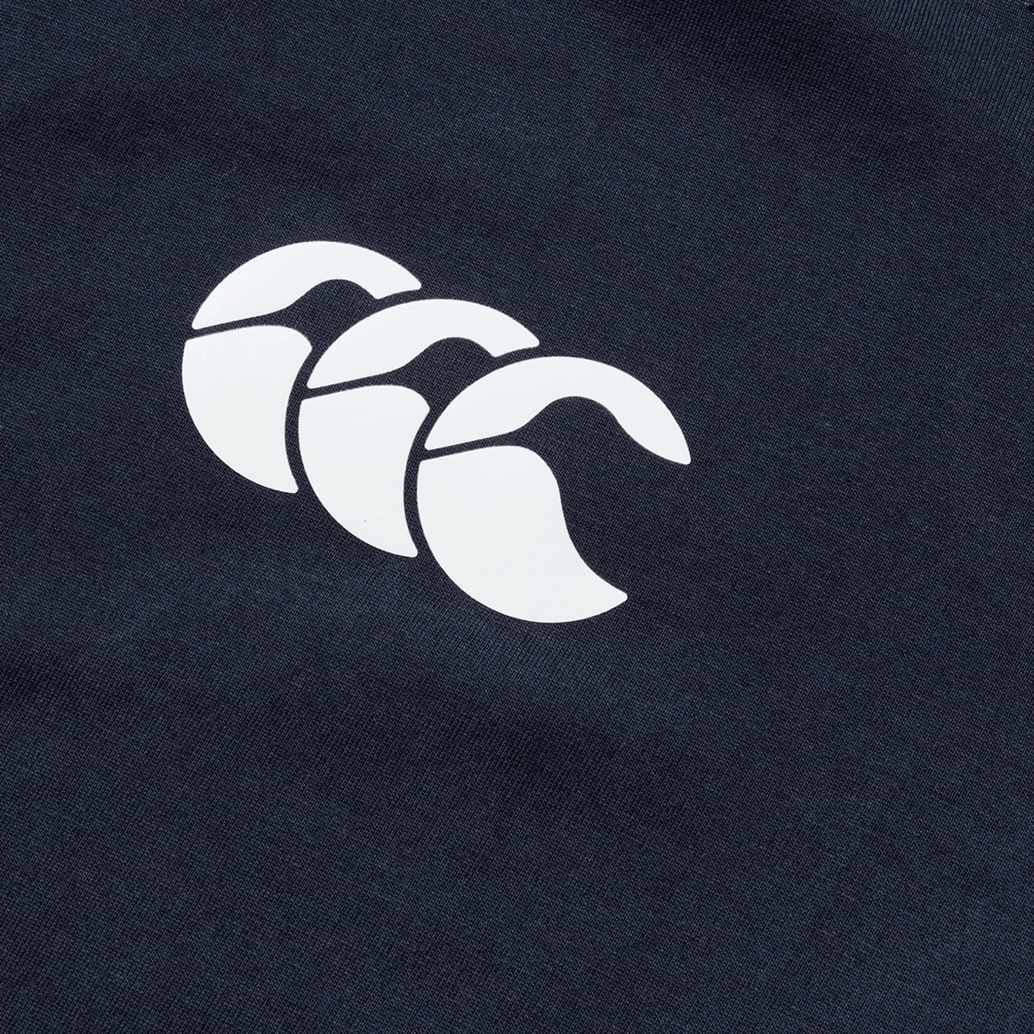 The British & Irish Lions 2025 Cotton Jersey Tee by Canterbury is made from organic cotton and showcases a white logo of three overlapping stylized waves on navy blue fabric.