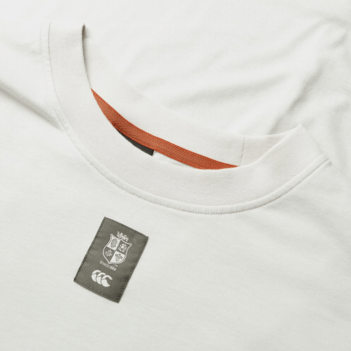 British & Irish Lions 25 Outback Long Sleeve Tee by Canterbury, showcasing a small rectangular embroidered Canterbury logo above the tag on the neckline, inspired by the British & Irish Lions.