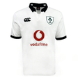 The Ireland 24 Alternate Classic Jersey by Canterbury features a white design with the Ireland Rugby Football Union (IRFU) logo on the left chest, a red Vodafone logo in the center, and a black collar and cuffs. This jersey is crafted using Canterbury's VapoDri technology for optimal performance.