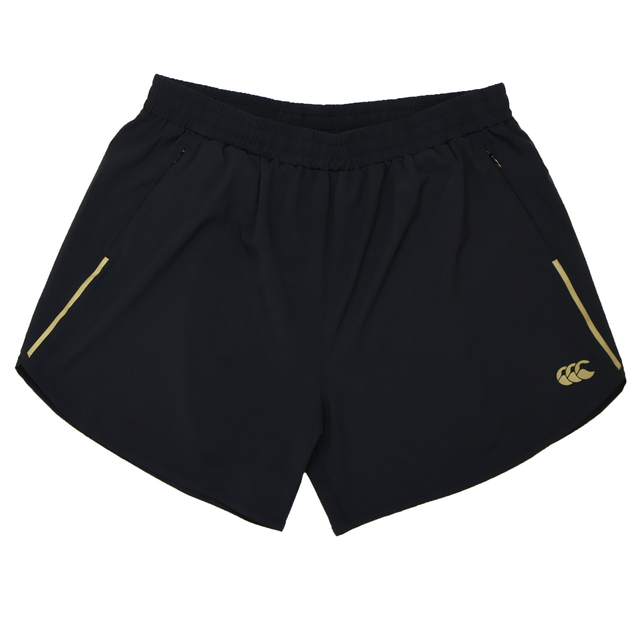 The Canterbury Women's Tempo+ 5" Training Shorts feature an elastic waistband, two zippered side pockets, moisture-wicking fabric, and a yellow logo on the lower right leg.