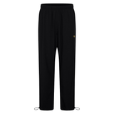 The Canterbury Tempo+ 32" Trackpant features an elastic waistband and a small Canterbury logo on the left thigh, shown in black against a plain white background.