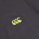 Close-up of the black Tempo+ Training Tank by Canterbury, made from moisture-wicking fabric with a small yellow-green Canterbury logo—ideal for athletic rugby training.