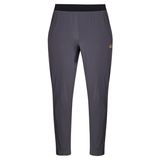 The Canterbury Everest Woven Pants are gray with an elastic waistband and a small gold logo on the left thigh—ideal performance training pants for any athlete, shown against a white background.
