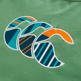Three stylized wave shapes with striped blue, teal, and orange patterns printed on green fabric, inspired by the Canterbury Uglies CCC Logo T-Shirt by Canterbury H225.