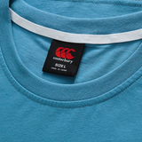 Close-up of the Canterbury Fundamentals CCC Logo T-Shirt in blue, featuring a visible black size L tag and "Made in China" under the collar—a genuine piece from Canterbury's core collection.