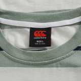 Close-up of a green and white striped collar from the Canterbury Fundamental Yarn Dye Stripe T-Shirt, showing a black brand tag labeled "SIZE L" and "MADE IN CHINA.