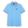 Canterbury Solid Dye Polo by Canterbury: This light blue short-sleeve athletic polo shirt features a collared neckline with two buttons, a black Canterbury logo on the left chest, and striped edging on the collar and sleeves.