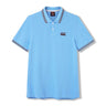 Canterbury Solid Dye Polo by Canterbury: This light blue short-sleeve athletic polo shirt features a collared neckline with two buttons, a black Canterbury logo on the left chest, and striped edging on the collar and sleeves.