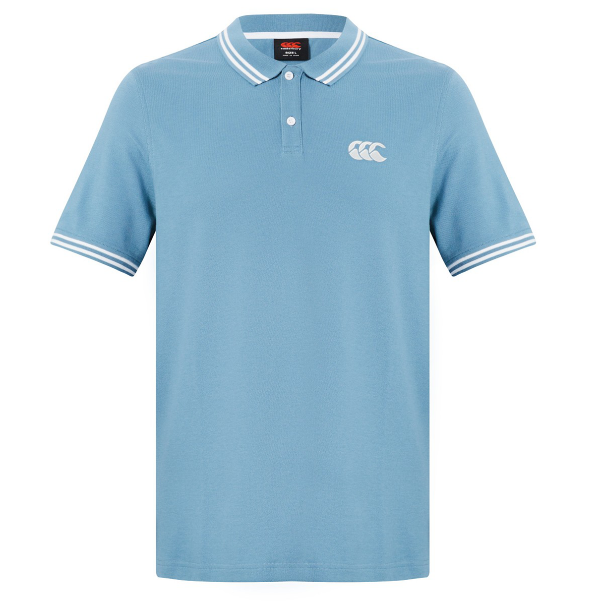 The Fundamental Solid Dye Polo by Canterbury features a light blue solid dye, white collar and sleeve stripes, three-button placket, and a white logo on the left chest for a classic rugby-inspired style.
