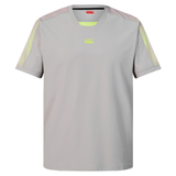 The Canterbury Tempo+ Drill Top is a light grey short-sleeve training top featuring yellow shoulder accents and a small chest logo, made from moisture-wicking fabric to keep you cool and comfortable during workouts.