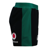 The Ireland 25/26 Alternate Match Short by Canterbury features black and green colors with Vodafone logos on the left front and right side, shown from a side angle—ideal for top-level rugby performance.