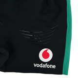 Close-up of the Ireland 25/26 Alternate Match Short by Canterbury—black rugby shorts with a green side panel, Vodafone logo, and black stripes. Perfect for match day.